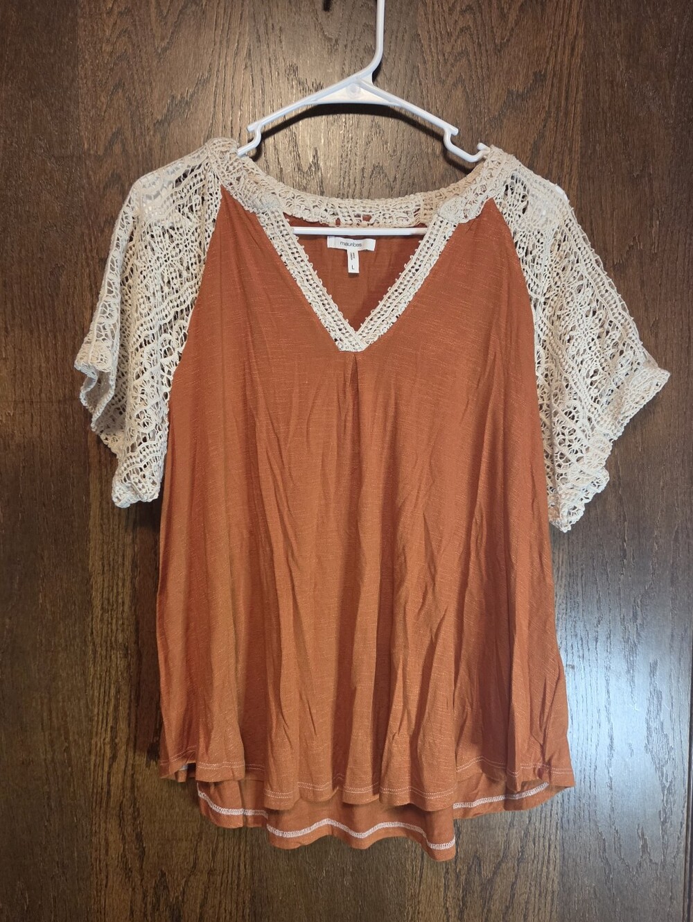 Maurices Rust Orange V-Neck Top with Cream Crochet Sleeves